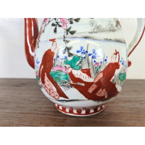 225 - A Japanese hand painted porcelain teapot - approx. 21cm high