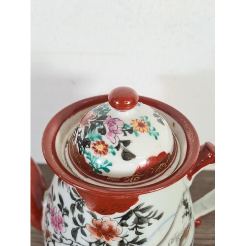 225 - A Japanese hand painted porcelain teapot - approx. 21cm high