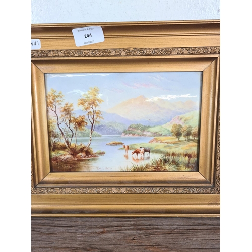 244 - A gilt framed hand painted porcelain plaque of Rydal Water signed to lower left - approx. 33cm wide ... 