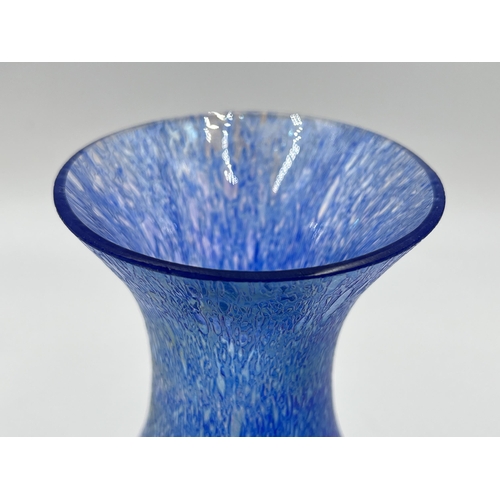 200 - A blue iridescent studio glass vase - approx. 16cm high