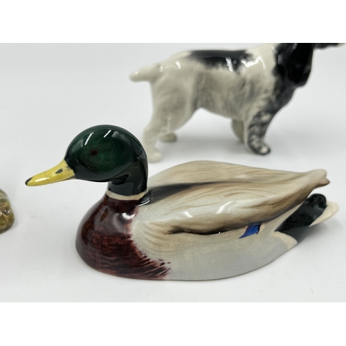 201 - Four Beswick animal figurines to include Mallard, Wren, Chaffinch etc.