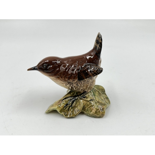 201 - Four Beswick animal figurines to include Mallard, Wren, Chaffinch etc.