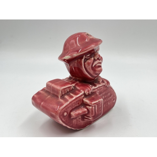 206 - A WWI Old Bill pink glazed ceramic money box - approx. 10cm high