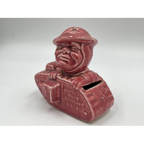 206 - A WWI Old Bill pink glazed ceramic money box - approx. 10cm high