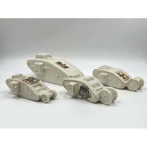 207 - Four crested china model tanks to include Grafton China City of Hereford, Shelley China Newark-Upon-... 