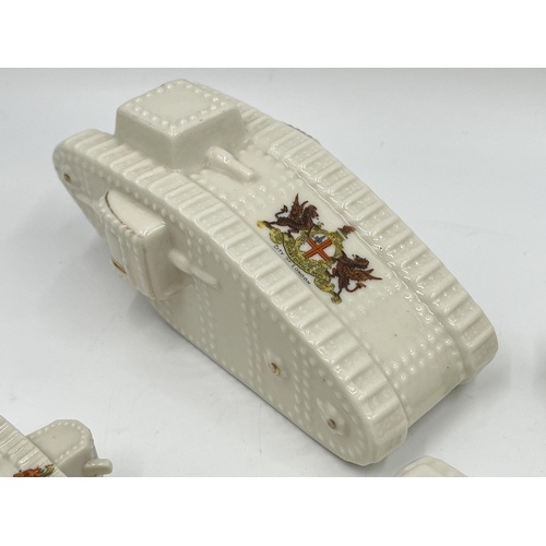 207 - Four crested china model tanks to include Grafton China City of Hereford, Shelley China Newark-Upon-... 