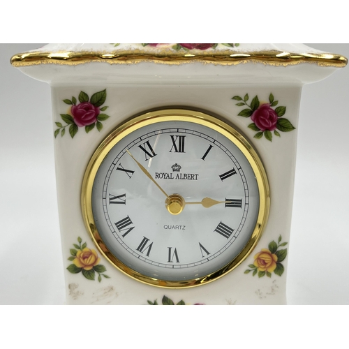 214 - A Royal Albert Old Country Roses quartz mantel clock - approx. 16.5cm high