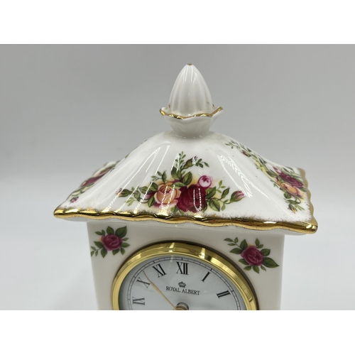 214 - A Royal Albert Old Country Roses quartz mantel clock - approx. 16.5cm high