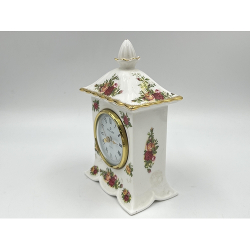 214 - A Royal Albert Old Country Roses quartz mantel clock - approx. 16.5cm high