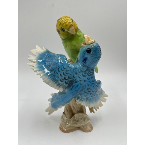 226 - Three ceramic budgerigar/parakeet figurines to include Goebel CV95, Staffordshire floral bone china ... 