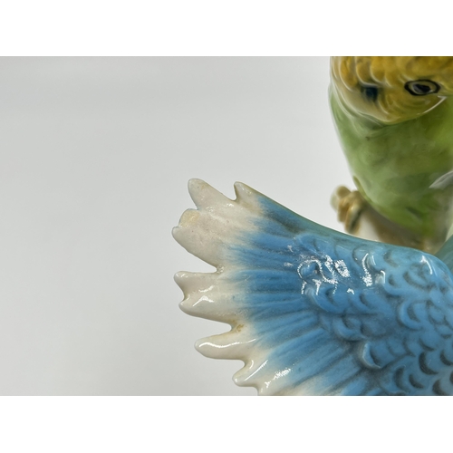 226 - Three ceramic budgerigar/parakeet figurines to include Goebel CV95, Staffordshire floral bone china ... 