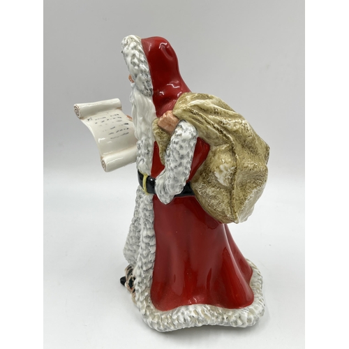 236 - A Royal Doulton Father Christmas figurine - HN 3399