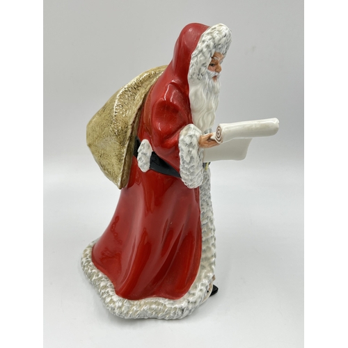 236 - A Royal Doulton Father Christmas figurine - HN 3399