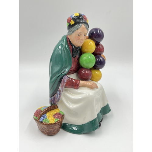 239 - A Royal Doulton The Old Balloon Seller figurine - HN 1315