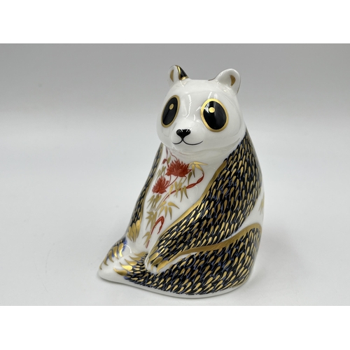 245 - A boxed Royal Crown Derby Panda paperweight with gold stopper