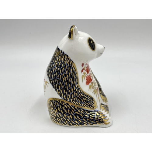 245 - A boxed Royal Crown Derby Panda paperweight with gold stopper