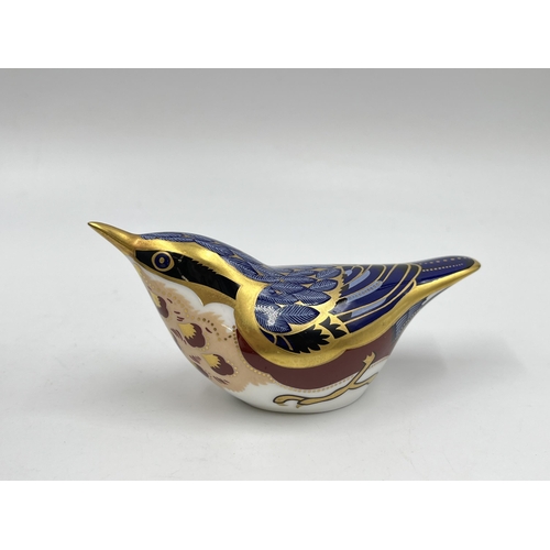 247 - A boxed Royal Crown Derby Nuthatch paperweight with gold stopper