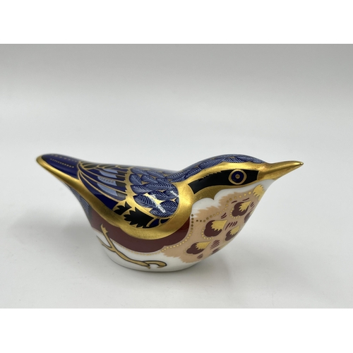 247 - A boxed Royal Crown Derby Nuthatch paperweight with gold stopper