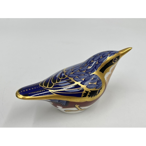 247 - A boxed Royal Crown Derby Nuthatch paperweight with gold stopper