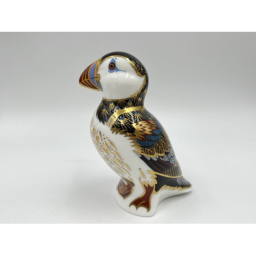 248 - A boxed Royal Crown Derby Puffin paperweight with gold stopper