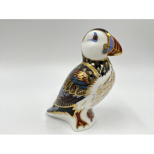 248 - A boxed Royal Crown Derby Puffin paperweight with gold stopper