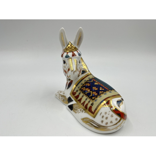 249 - A boxed Royal Crown Derby Donkey paperweight with gold stopper