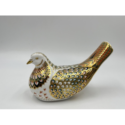 255 - A boxed Royal Crown Derby Turtle Dove paperweight with gold stopper