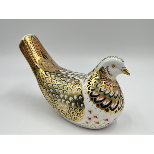 255 - A boxed Royal Crown Derby Turtle Dove paperweight with gold stopper