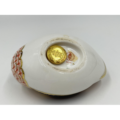 258 - A Royal Crown Derby Quail paperweight with gold stopper