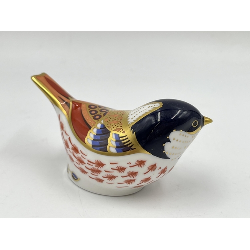 261 - A Royal Crown Derby Coal Tit paperweight with gold stopper