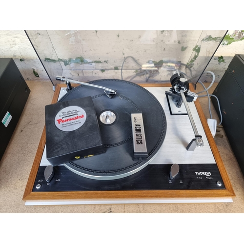 698 - A Thorens TD160 two-speed belt-drive turntable (headshell, cartridge and stylus in office)