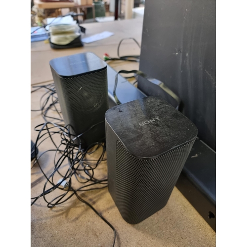 720 - A Sony four speaker sound system comprising active subwoofer, SS-S20R soundbar and two satellite spe... 