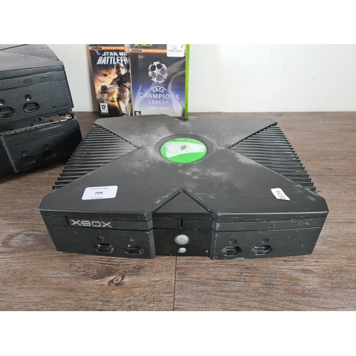 799 - Three Microsoft Xbox Original games consoles with two games, UEFA Champions League 04-05 and Star Wa... 