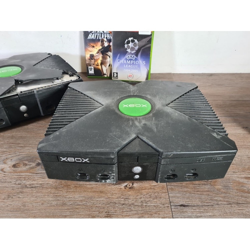 799 - Three Microsoft Xbox Original games consoles with two games, UEFA Champions League 04-05 and Star Wa... 