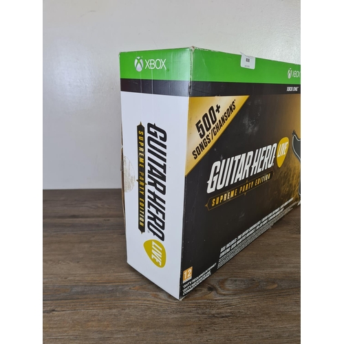 808 - A boxed Guitar Hero Live Supreme Party Edition two guitar bundle for Xbox