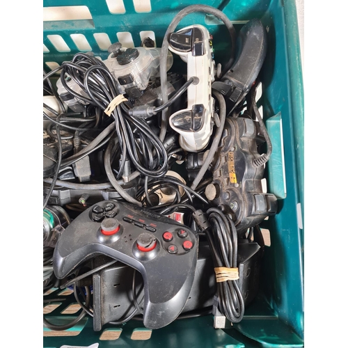 820 - A large collection of game console controllers