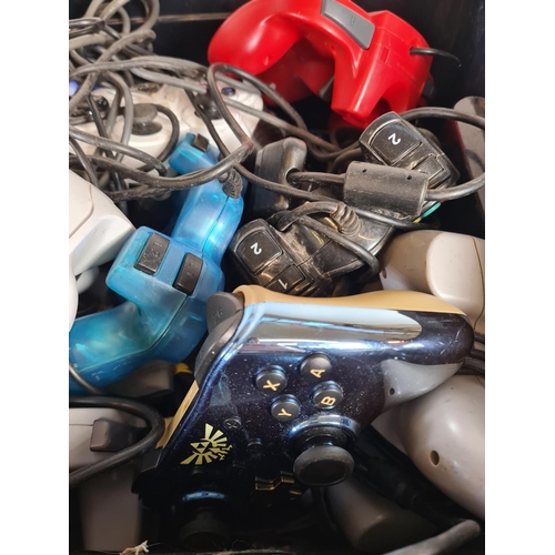 821 - A large collection of game console controllers