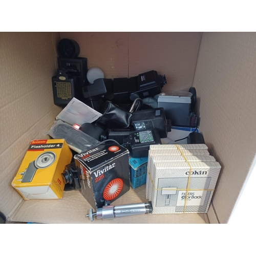 682 - Four boxes containing a large quantity of camera and cine equipment to include cased Halina Super8 c... 