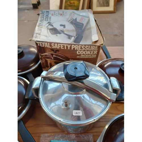 836 - Six items, five Club lidded aluminium cooking pots and one boxed Tefal safety pressure cooker