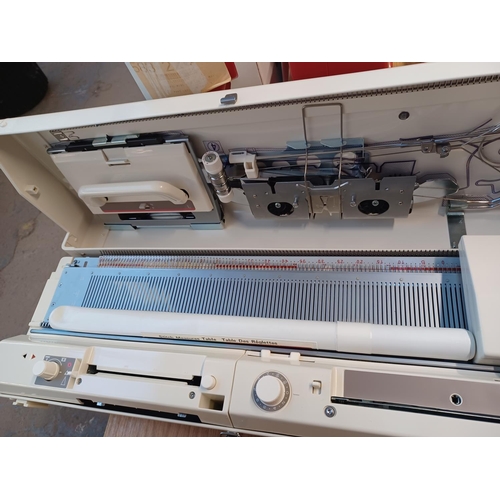 843 - A cased Brother KH-891 knitting machine