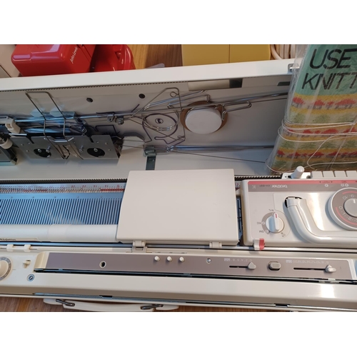 843 - A cased Brother KH-891 knitting machine