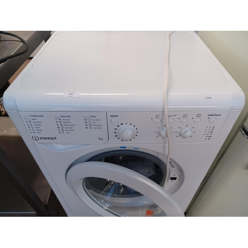 865 - an Indesit 7kg washing  machine with instruction manual - approx. 60cm wide