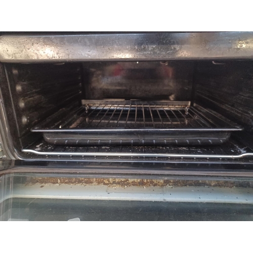 867 - A Beko DVC563 twin oven, four burner hob electric cooker - approx. 50cm wide