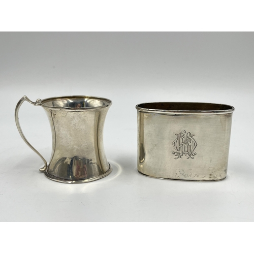 1242 - Two pieces of hallmarked silver, one Victorian Army & Navy Cooperative Society Ltd London hip flask ... 