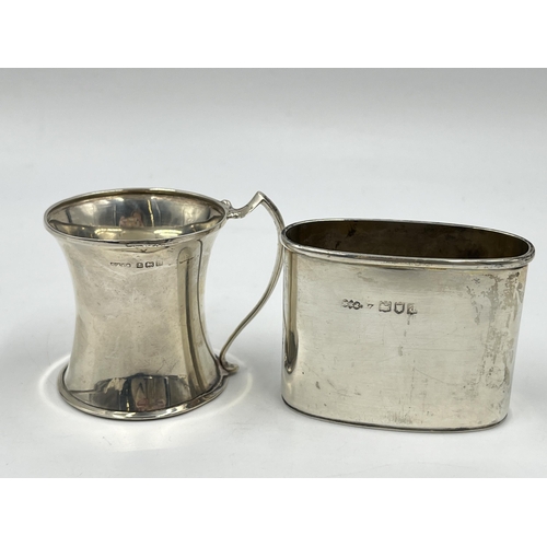 1242 - Two pieces of hallmarked silver, one Victorian Army & Navy Cooperative Society Ltd London hip flask ... 