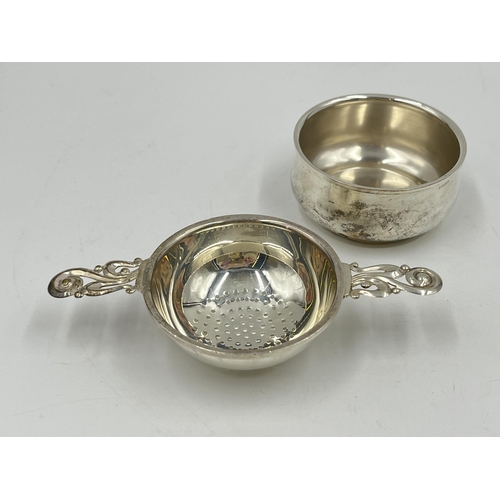 1249 - An Elizabeth II Henry Clifford Davis hallmarked Birmingham silver tea strainer, dated 1963 - approx.... 