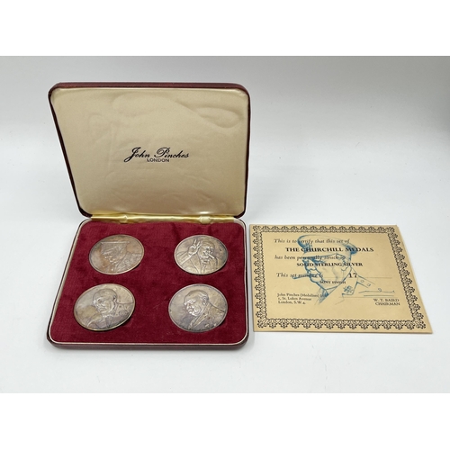 1232 - A boxed set of four John Pinches London solid sterling silver Churchill medals - approx. gross weigh... 