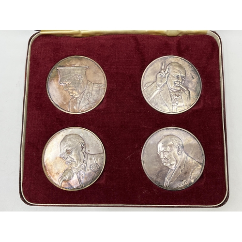 1232 - A boxed set of four John Pinches London solid sterling silver Churchill medals - approx. gross weigh... 