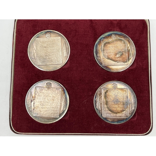 1232 - A boxed set of four John Pinches London solid sterling silver Churchill medals - approx. gross weigh... 