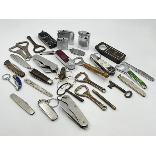 1237 - A collection of pocket knives, bottle openers and cigarette lighters